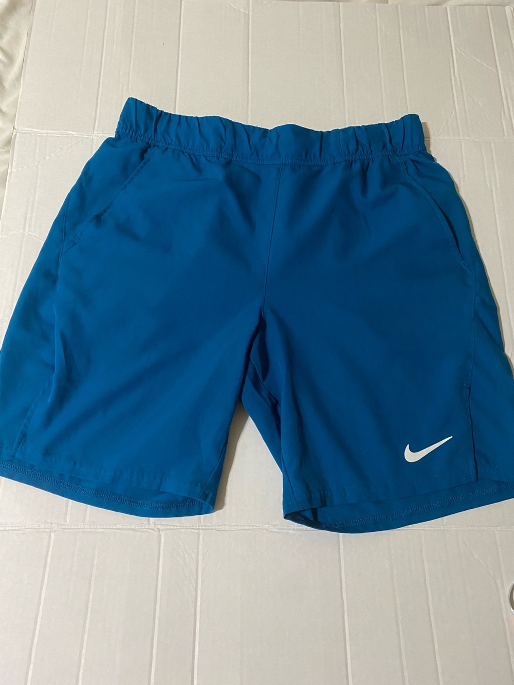 Nike Men's Bright Teal Athletic Shorts with White Swoosh
